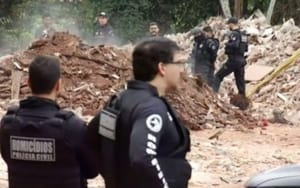 Polícia usa máquinas para procurar corpo em lixão e prende três suspeitos em Goiânia